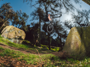 mountain biker doing stunt outside