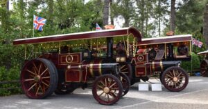 two steam engines with British flag outside